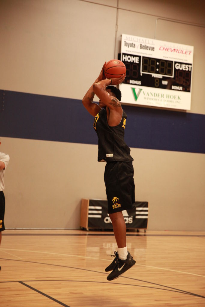 Basketball player taking a jump shot